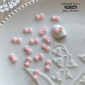 50pcs Bowknot Plastic Nail Art Decorations #23 Clearance No Brand 